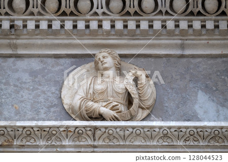 Persian Sibyl, relief on the portal of the Cathedral of Saint Lawrence in Lugano, Switzerland 128044523