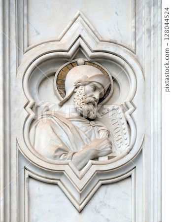 Saint Judas, relief on the facade of Basilica of Santa Croce (Basilica of the Holy Cross) - famous Franciscan church in Florence, Italy Saint Judas, relief on the facade of Basilica of Santa Croce (Basilica of the Holy Cross) - famous Franciscan church in Florence, Italy 128044524