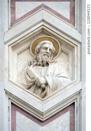 Saint Bartholomew the Apostle, relief on the facade of Basilica of Santa Croce (Basilica of the Holy Cross) - famous Franciscan church in Florence, Italy 128044525