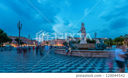 The Fountain du Soleil on Place Massena square Nice day to night timelapse, French Riviera, Cote d'Azur, France The Fountain du Soleil on Place Massena square Nice day to night timelapse, French Riviera, Cote d'Azur, France 128044542
