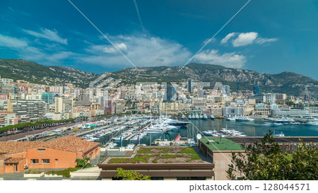 Monte Carlo city aerial panorama timelapse hyperlapse. Port Hercule from top. Monte Carlo city aerial panorama timelapse hyperlapse. Port Hercule from top. 128044571