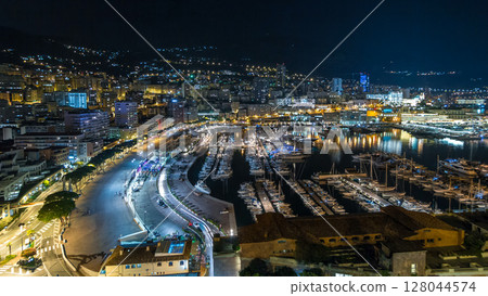 Panorama of Monte Carlo timelapse hyperlapse at night from the observation deck in the village of Monaco Panorama of Monte Carlo timelapse hyperlapse at night from the observation deck in the village of Monaco 128044574