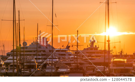 Beautiful sunrise over the harbor in Monaco timelapse. 128044578