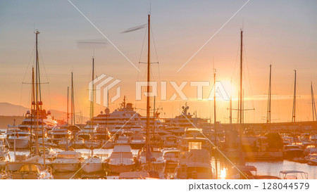 Beautiful sunrise over the harbor in Monaco timelapse. 128044579