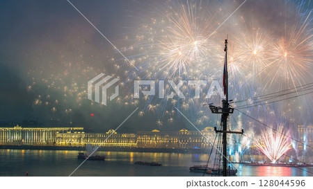 Fireworks timelapse over the city of St. Petersburg Russia on the feast of Scarlet Sails, view from rooftop. 128044596