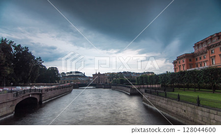 View of the Embankment of the river Moyka and Mikhailovsky Castle timelapse hyperlapse. Saint Petersburg. Russia. 128044600