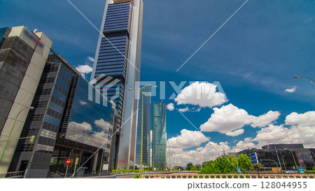 Skyscrapers timelapse hyperlapse in the Four Towers Business Area with the tallest skyscrapers in Madrid and Spain 128044955