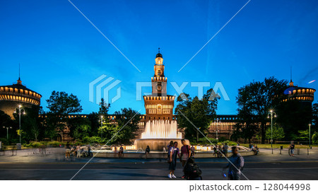 Main entrance to the Sforza Castle and tower - Castello Sforzesco day to night timelapse, Milan, Italy 128044998