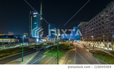 Milan skyline with modern skyscrapers in Porta Nuova business district night timelapse hyperlapse in Milan, Italy 128045004