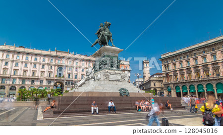 Vittorio Emanuele II statue at Piazza del Duomo timelapse hyperlapse. Milan in Lombardy, Italy. 128045016