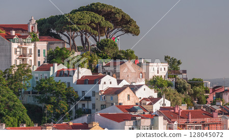 Famous viewpoint Miradouro da Senhora do Monte with church and city view of Lisbon timelapse. Portugal 128045072