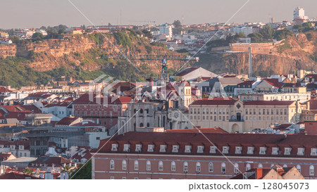 Baixa district with Santa Justa Lift timelapse and Convento da Ordem do Carmo historical church. Lisbon 128045073