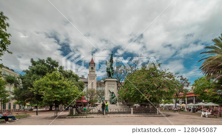 Aerial drone view of people relaxing at Dom Luis Garden in the Baixa District of Lisbon, Portugal on a warm spring day with surrounding urban cityscape in the background Aerial drone view of people relaxing at Dom Luis Garden in the Baixa District of Lisbon, Portugal on a warm spring day with surrounding urban cityscape in the background 128045087