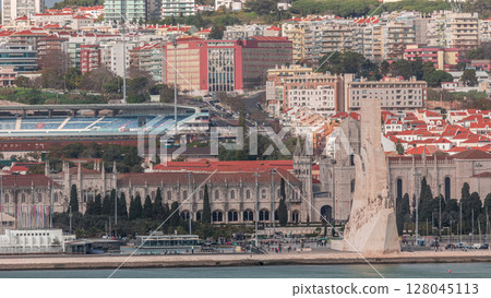Aerial timelapse of Mosteiro dos Jeronimos and Monument to the Discoveries in the Belem district of Lisbon, Portugal. Aerial timelapse of Mosteiro dos Jeronimos and Monument to the Discoveries in the Belem district of Lisbon, Portugal. 128045113