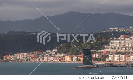 Aerial timelapse of Torre VTS de Lisboa, Lisbon's Vessel Traffic System tower for maritime coordination Aerial timelapse of Torre VTS de Lisboa, Lisbon's Vessel Traffic System tower for maritime coordination 128045114