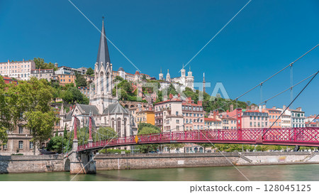 Timelapse hyperlapse of Saint George Church, Quais de Saone, and Fourviere Basilica from a footbridge in Vieux Lyon, France Timelapse hyperlapse of Saint George Church, Quais de Saone, and Fourviere Basilica from a footbridge in Vieux Lyon, France 128045125