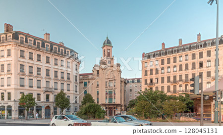 Hyperlapse of Place Antonin Jutard and the Mutuality Palace facade from the waterfront near Guillotiere Bridge in Lyon, France. 128045131