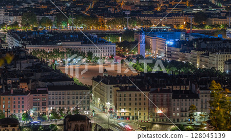 Aerial timelapse of Place Bellecour from Fourviere Hill in Lyon, France, the largest pedestrian square in Europe at night 128045139