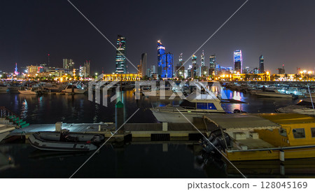 Yachts and boats at the Sharq Marina night timelapse hyperlapse in Kuwait. Kuwait City, Middle East Yachts and boats at the Sharq Marina night timelapse hyperlapse in Kuwait. Kuwait City, Middle East 128045169