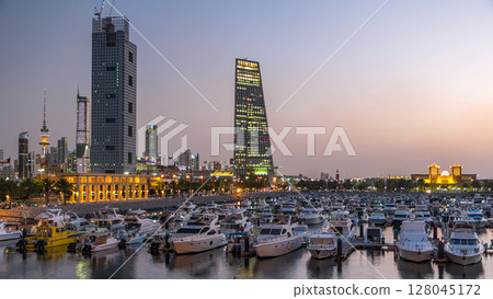 Yachts and boats at the Sharq Marina day to night timelapse in Kuwait. Kuwait City, Middle East Yachts and boats at the Sharq Marina day to night timelapse in Kuwait. Kuwait City, Middle East 128045172