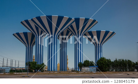 Blue and white water towers in Kuwait timelapse hyperlapse, Middle East 128045179