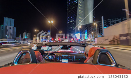 Drive through the traffic in the city highway timelapse hyperlapse in Kuwait. Kuwait, Middle East 128045180