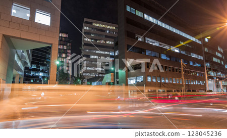 Night cityscape in business area with illuminated skyscrapers timelapse hyperlapse. San Isidro district Lima, Peru Night cityscape in business area with illuminated skyscrapers timelapse hyperlapse. San Isidro district Lima, Peru 128045236