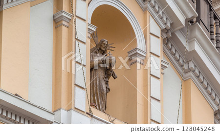 Statue on Basilica of San Pedro timelapse hyperlapse built by the Society of Jesus in the sixteenth century. Lima, Peru Statue on Basilica of San Pedro timelapse hyperlapse built by the Society of Jesus in the sixteenth century. Lima, Peru 128045248