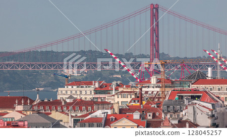 Aerial view towards Barrio Alto and 25th of April Bridge timelapse, Lisbon, Portugal. Aerial view towards Barrio Alto and 25th of April Bridge timelapse, Lisbon, Portugal. 128045257