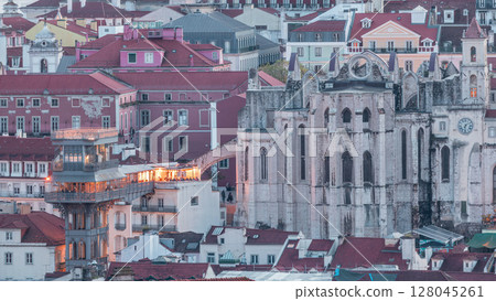 Santa Justa Lift day to night timelapse, also called Carmo Lift and Convento da Ordem do Carmo, historical church. Portugal Santa Justa Lift day to night timelapse, also called Carmo Lift and Convento da Ordem do Carmo, historical church. Portugal 128045261