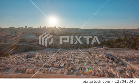 Jerusalem panorama view over the City at sunset timelapse with the Dome of the Rock from the Mount of Olives. 128045346