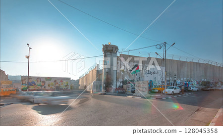 The Israeli West Bank barrier is a separation barrier timelapse hyperlapse. Bethlehem, Palestine. 128045358