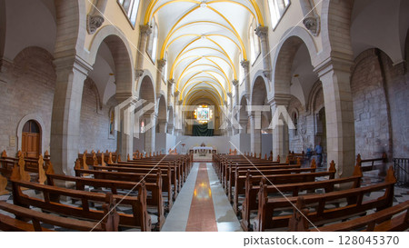 Church of the Nativity interior with altar and icon lamps hanging on long chain in Bethlehem timelapse hyperlapse. 128045370