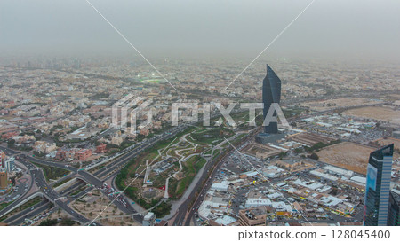 Kuwait City cityscape day to night timelapse is the capital of Kuwait. Sunset time. Kuwait City cityscape day to night timelapse is the capital of Kuwait. Sunset time. 128045400
