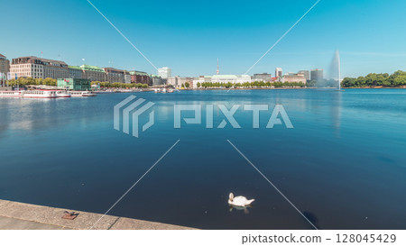Panorama showing Binnenalster timelapse in Hamburg, Germany, with boat station. 128045429