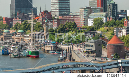 Jan Fedder Promenade aerial timelapse in Hamburg, Germany, a vibrant waterfront area. Jan Fedder Promenade aerial timelapse in Hamburg, Germany, a vibrant waterfront area. 128045434