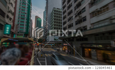A Hong Kong streets view timelapse from open-top touristic bus during Hong Kong island's touring A Hong Kong streets view timelapse from open-top touristic bus during Hong Kong island's touring 128045461