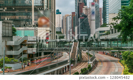 Hong Kong traffic timelapse in Central District of Hong Kong. Hong Kong traffic timelapse in Central District of Hong Kong. 128045482