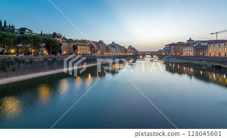 River Arno and famous bridge Ponte Vecchio day to night timelapse after sunset in Florence, Tuscany, Italy 128045601