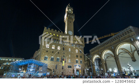 Arnolfo tower of Palazzo Vecchio timelapse hyperlapse on the Piazza della Signoria at twilight in Florence, Tuscany, Italy 128045602