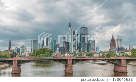 Aerial hyperlapse of Frankfurt skyline with Main River and Ignatz Bubis Bridge. Frankfurt, Germany Aerial hyperlapse of Frankfurt skyline with Main River and Ignatz Bubis Bridge. Frankfurt, Germany 128045628