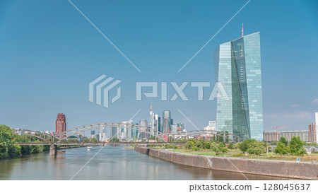 Hyperlapse of Frankfurt skyline featuring the modern ECB headquarters skyscraper. Frankfurt am Main, Germany Hyperlapse of Frankfurt skyline featuring the modern ECB headquarters skyscraper. Frankfurt am Main, Germany 128045637