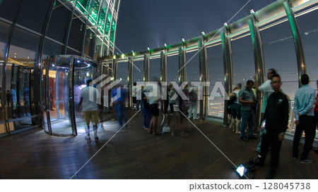 At The Top - Observation Deck of Burj Khalifa at night. Dubai, United Arab Emirates timelapse 128045738