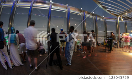 At The Top - Observation Deck of Burj Khalifa at night. Dubai, United Arab Emirates timelapse 128045739