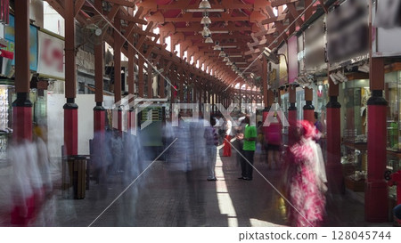 At entrance of the Dubai Gold Souq in Dubai timelapse At entrance of the Dubai Gold Souq in Dubai timelapse 128045744
