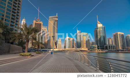 Dubai Marina with tallest skyscrapers and boats timelapse hyperlapse Dubai Marina with tallest skyscrapers and boats timelapse hyperlapse 128045772