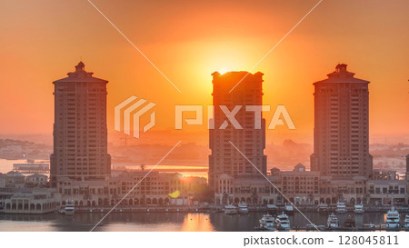 Sunset at the Pearl-Qatar timelapse from top. Sunset at the Pearl-Qatar timelapse from top. 128045811