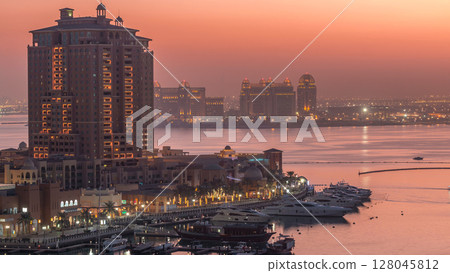 Evening at the Pearl-Qatar day to night timelapse from top. 128045812