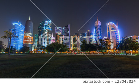 The skyline of Doha by night with starry sky seen from Park timelapse hyperlapse, Qatar 128045824