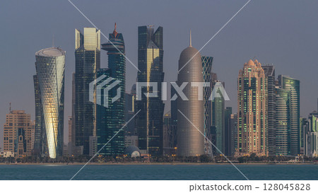 Skyline of Doha night to day transition timelapse in Qatar Skyline of Doha night to day transition timelapse in Qatar 128045828